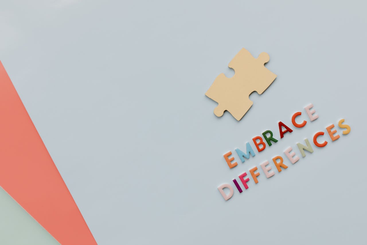 Colorful letters and puzzle piece promoting diversity and inclusion.